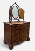 19TH CENTURY MAHOGANY SERPENTINE CHEST, four graduated long drawers below brushing slide, ornate