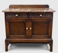 ANTIQUE CARVED OAK MARBLE-TOP CABINET/WASHSTAND, two frieze drawers over two cupboard doors, fixed