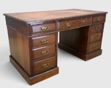EARLY 20TH CENTURY OAK PEDESTAL DESK, gilt-tooled leather inset writing surface, attractive medullay