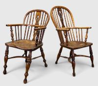 TWO ANTIQUE BOW BACK WINDSOR ARMCHAIRS, pierced splats, saddle seats, baluster arm supports and
