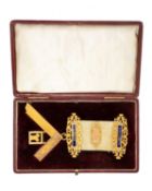 MASONIC INTEREST: 9CT GOLD PRESENTATION JEWEL, the pale green ribbon with three bars, two with