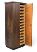MID-CENTURY TALL FILING CUPBOARD with two interior rows of sliding trays, 158 (h) x 63 (w) x