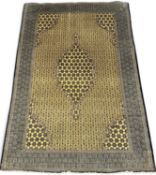 SIRJAN WOOL CARPET, yellow ground centre field 260 x 164cms Provenance: private collection