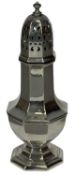 GEORGE V SILVER SUGAR CASTOR of panelled baluster form, with pierced top, London 1934, 19cms (h),