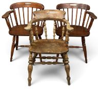 THREE SMOKER'S BOW TYPE ELBOW CHAIRS, two similar in stained pine and an oak example (3) Provenance: