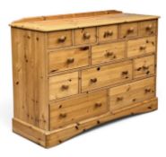 MODERN PINE LONG MULTI-DRAWER CHEST with rail back, 88 (h) x 126 (w) x 45cms (d) Provenance: private