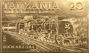 LOCOMOTIVE PHILATELICA FOUR LIMITED EDITION 22CT GOLD STAMPS from Tanzania, with the traditional