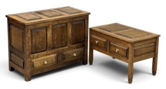 20TH CENTURY OAK COFFOR BACH, lift lid with two base drawers and brass knobs, raised and fielded