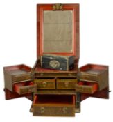 CHINESE LACQUERED LADIES' TRAVELLING VANITY BOX with brass fittings, lid lifting to reveal