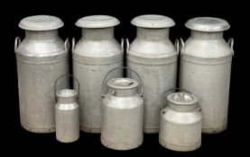 FOUR LIDDED MILK CHURNS, 73 (h) x 34cms (diam.); and three smaller (7) Provenance: deceased estate