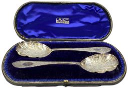 PAIR OF EDWARD VII SILVER SERVING SPOONS, chased decoration and with gilded bowls, Josiah Williams &