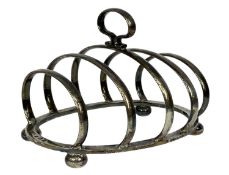 GEORGE V SILVER FOUR-DIVISION TOAST RACK with loop handle, on bun feet, G. Unite & Sons and Lyde