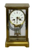 FRENCH GILDED BRASS-CASED FOUR-GLASS MANTEL CLOCK, late 19th century, 8-day movement striking on a
