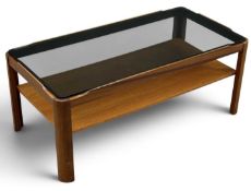 MID-CENTURY TEAK COFFEE TABLE, labelled for Myer, with smoked glass top Provenance: private
