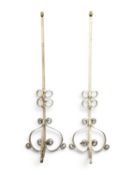 PAIR OF ORNATE SCROLLED METAL STANDARD LAMPS on tripod bases, 161cms (h) Provenance: private