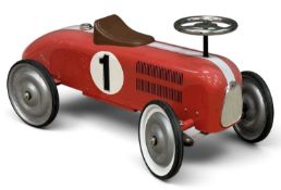 NOSTALGIC TIN-PLATE RIDE-ON MOTOR CAR, 36 (h) x 77 (l) x 36cms (w) Provenance: private collection
