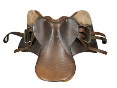 ENGLISH LEATHER SADDLE, 'sprung seat' with stirrups attached Provenance: private collection Conwy