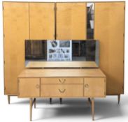 MID-CENTURY BEDROOM FURNITURE by Meredew, comprising light wood ladies' wardrobe, 184 (h) x 122 (
