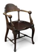 UNUSUAL EDWARDIAN MAHOGANY ELBOW CHAIR with curved and light carved back, 87 (h) x 60 (w) x 45cms (