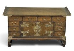 KOREAN SCHOOL POLISHED OAK MULTI-DRAWER WRITING DESK with brass mounts and furniture, 47 (h) x 87 (