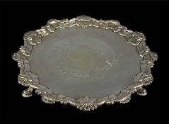 GEORGE II CIRCULAR SILVER CARD TRAY with shell-moulded border, centre engraved with vacant