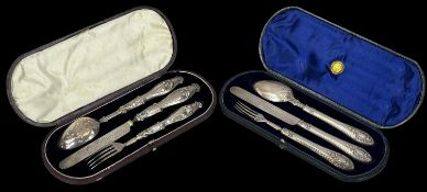 TWO CASED VICTORIAN CHRISTENING SETS, each containing a spoon, knife and fork, Martin Hall & Co.,