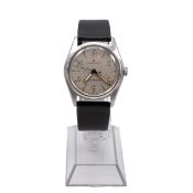 A vintage Rolex Oyster Shock-Resisting watch, manual wind, silvered dial, luminous Arabic