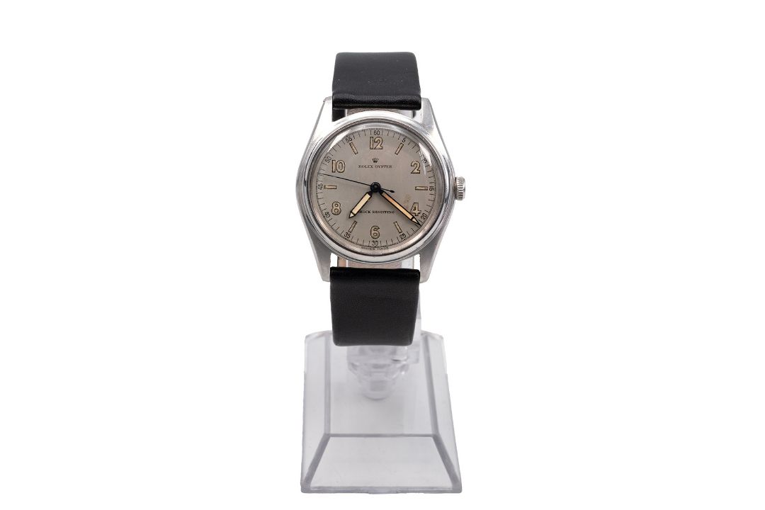 A vintage Rolex Oyster Shock-Resisting watch, manual wind, silvered dial, luminous Arabic - Image 1 of 5