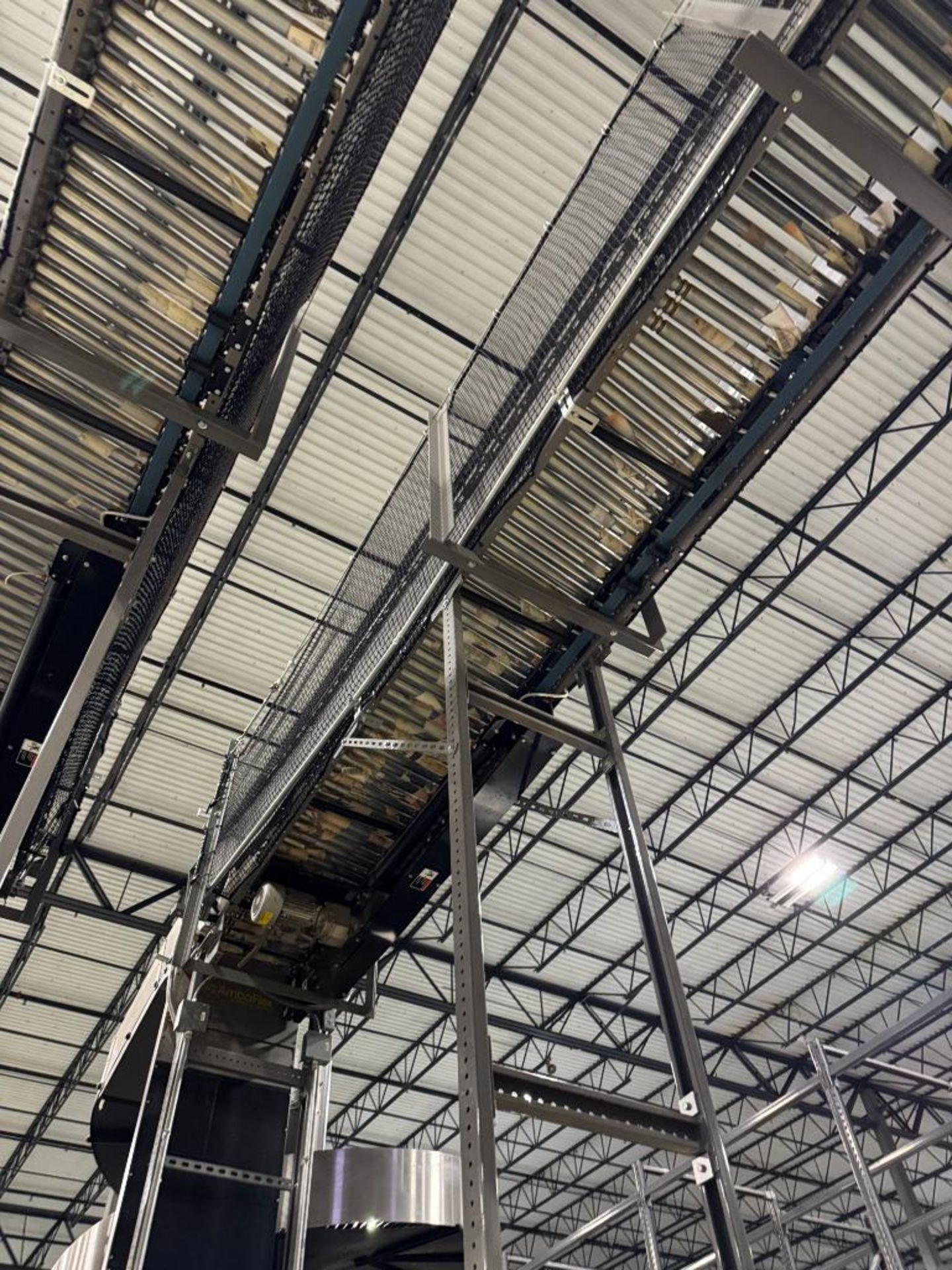 Invata partially powered roller conveyor, on ~16' uprights