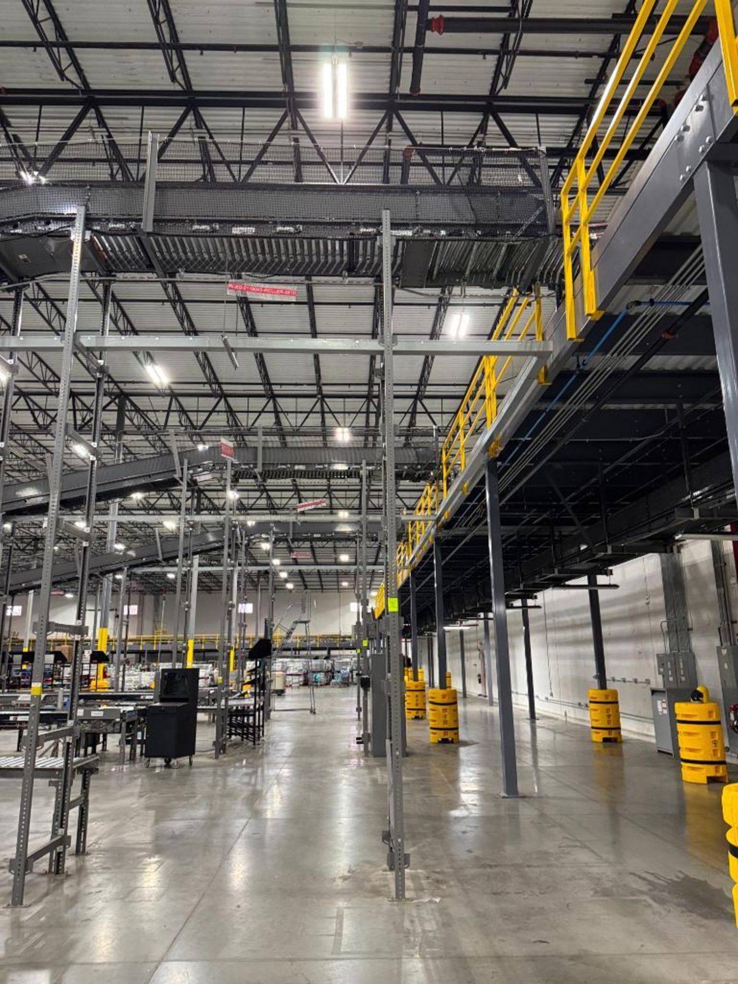 Invata partially powered roller conveyor, on ~16' uprights - Image 2 of 3