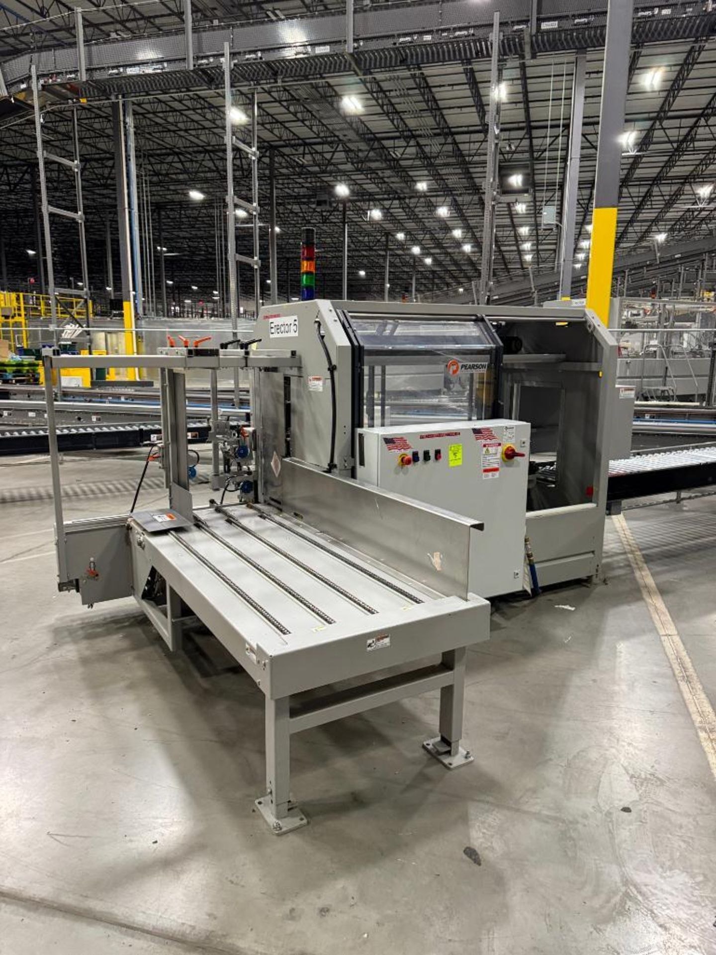 Pearson Packaging case erector, cardboard box builder
