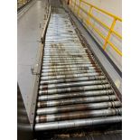 Invata partially powered roller conveyor w/ box straightener