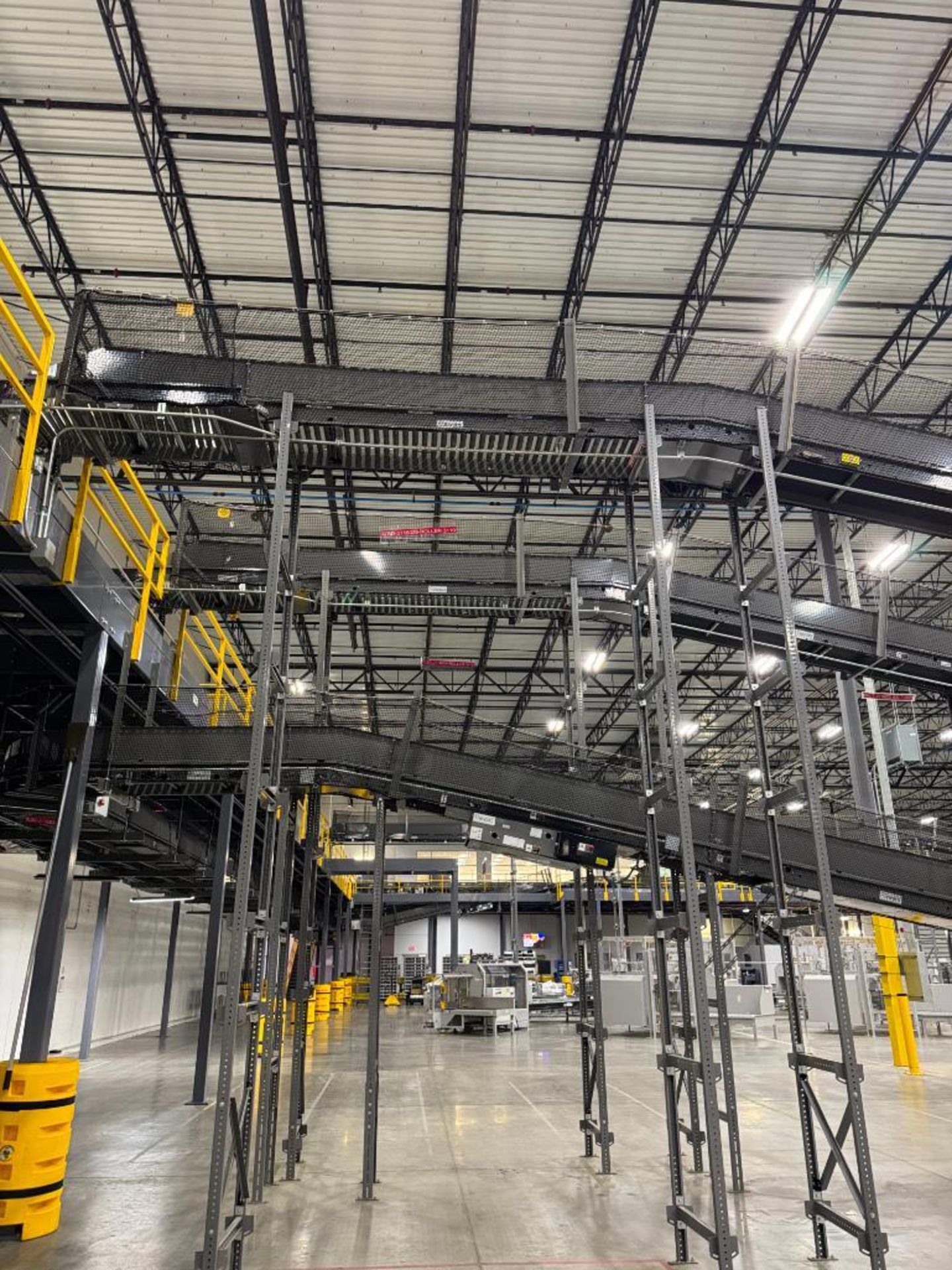 Invata partially powered roller conveyor, on ~16' uprights - Image 2 of 3