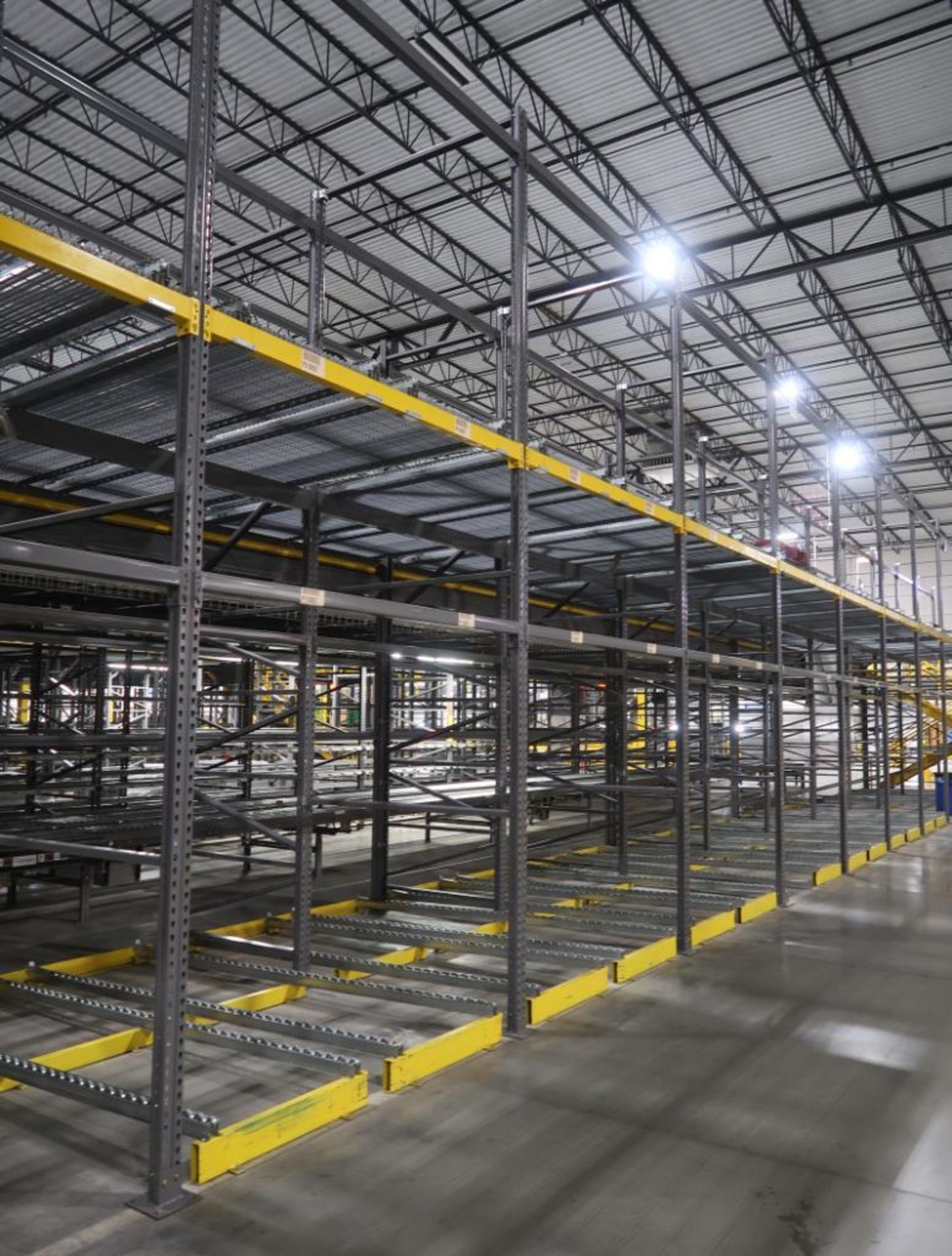 11) sections of pallet racking w/ gravity flow rollers