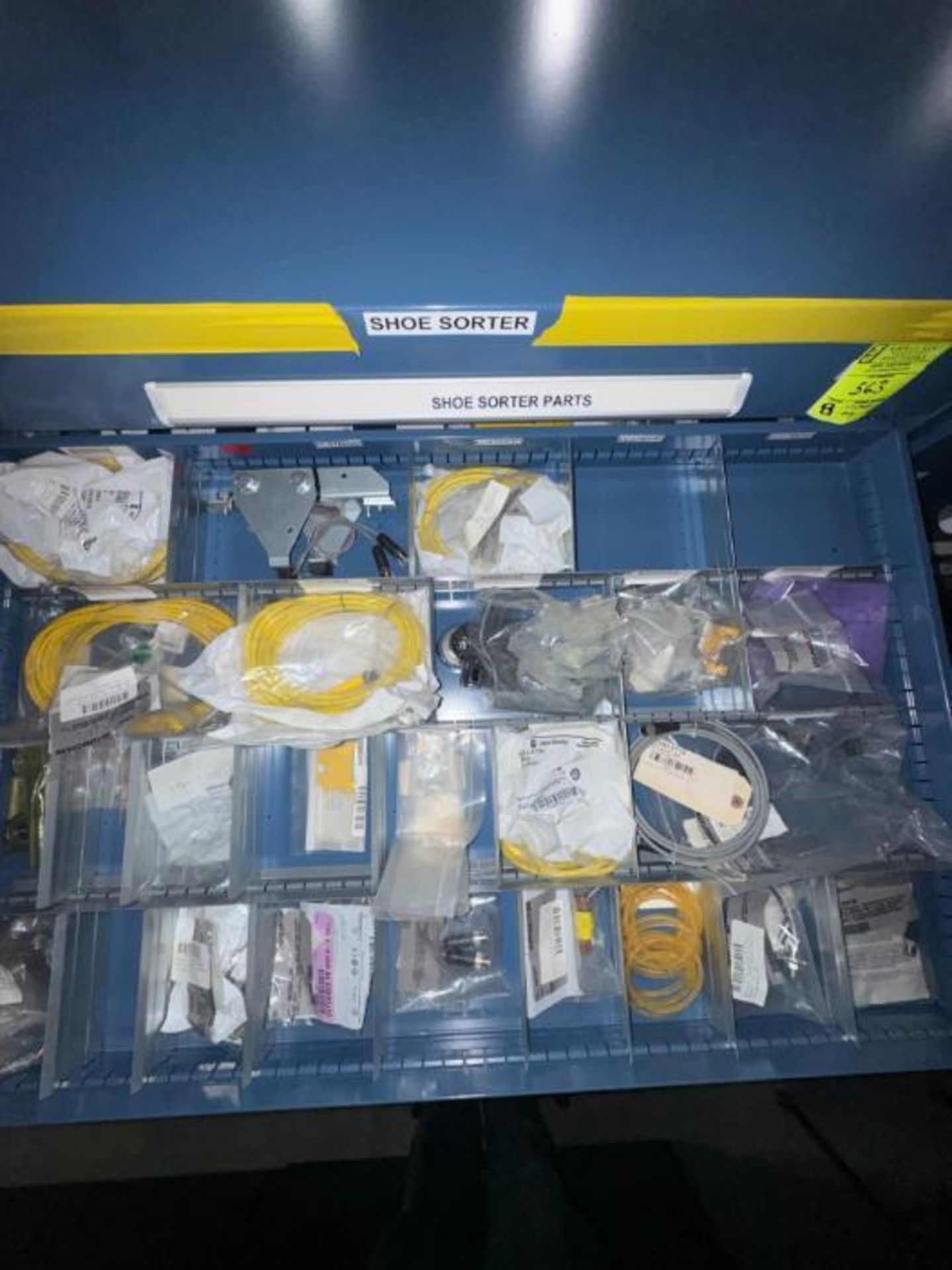 contents of 8) drawers- shoe sorter parts- drive shafts, belts,