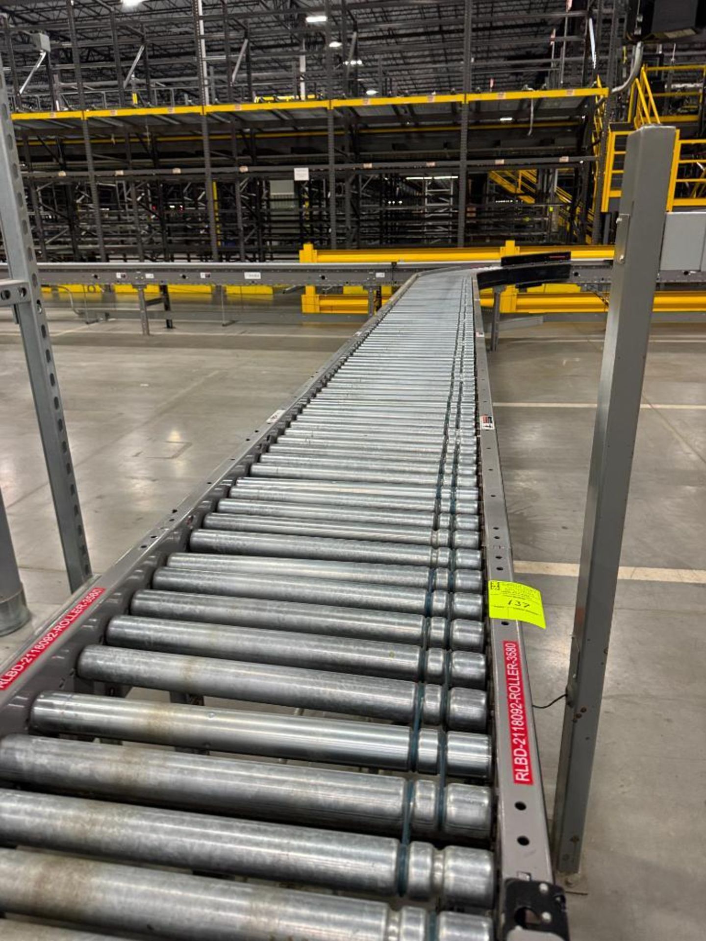 Invata partially powered roller conveyor w/ merger