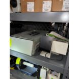 contents of shelf- Sealed Air Fill-Air rockets, label rollers, etc