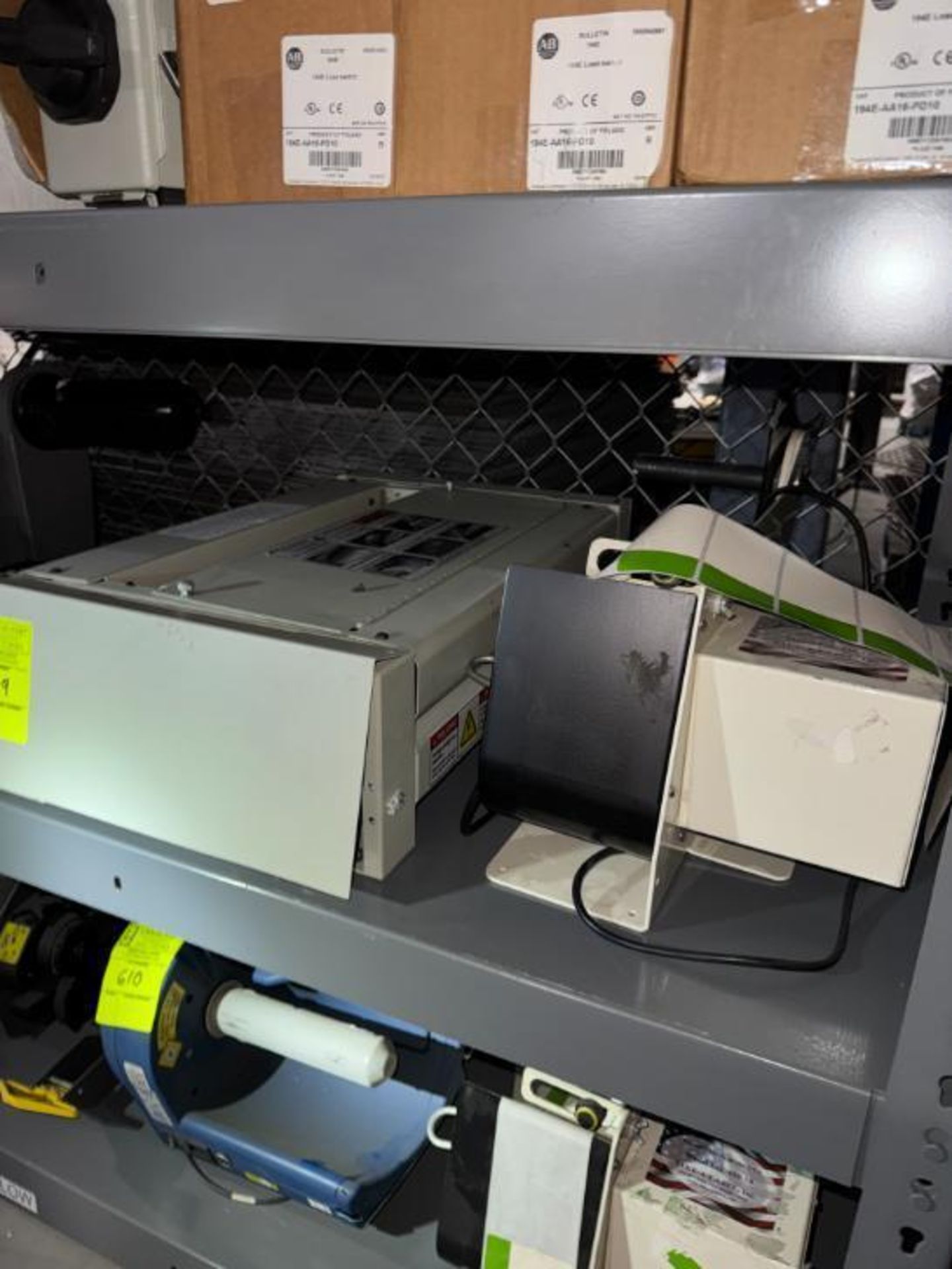 contents of shelf- Sealed Air Fill-Air rockets, label rollers, etc
