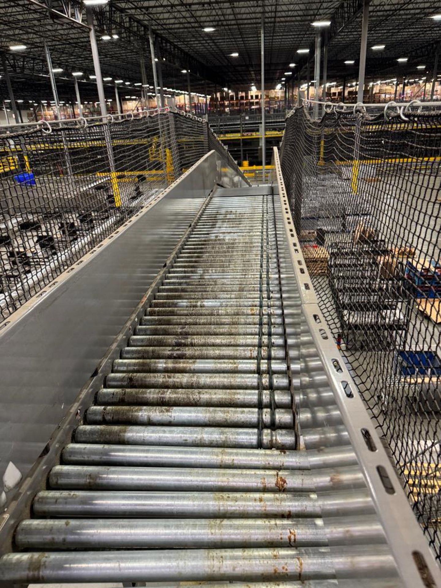 Invata partially powered roller conveyor, on ~16' uprights - Image 3 of 3