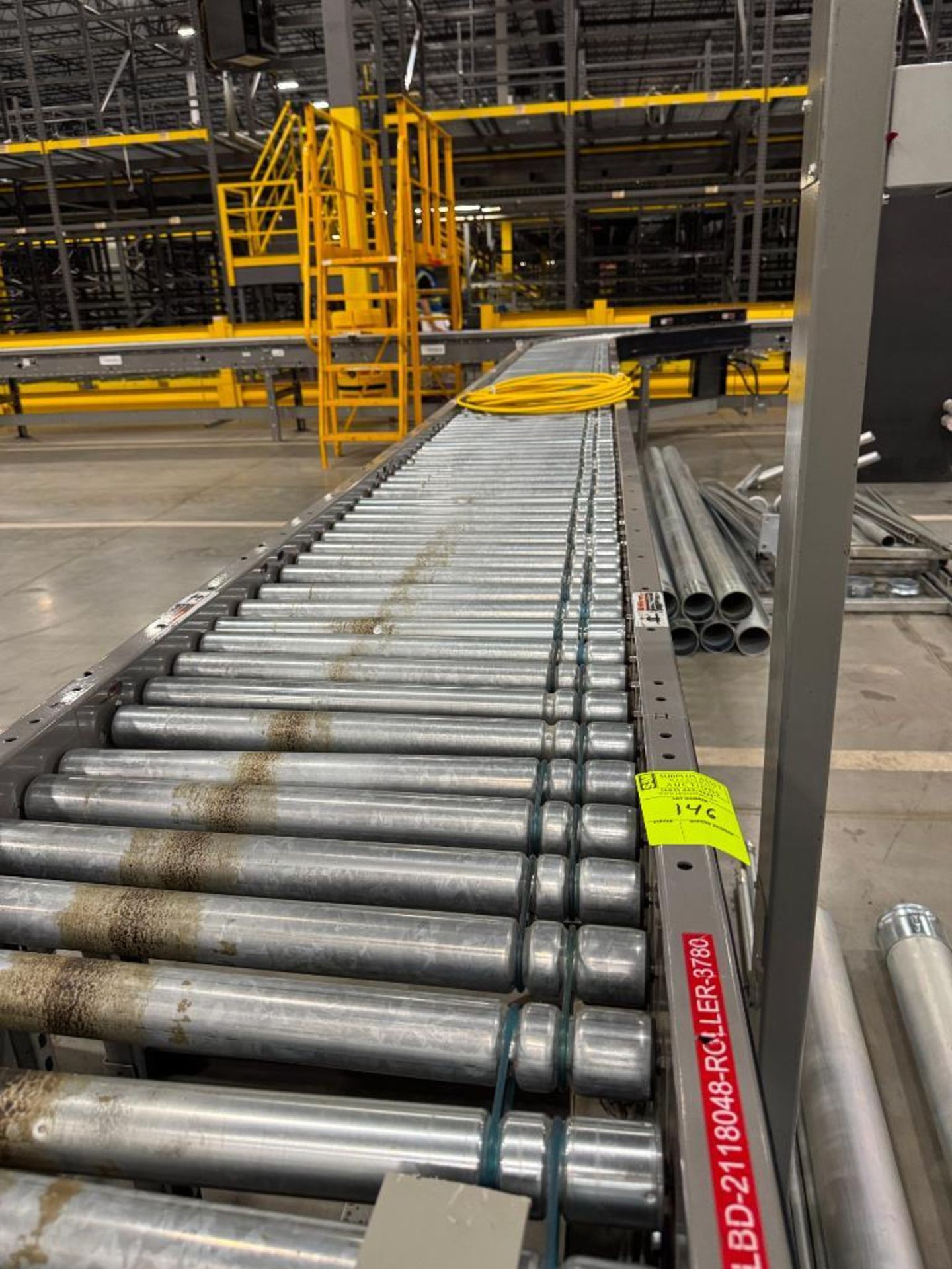 Invata partially powered roller conveyor w/ merger