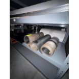 contents of warehouse racks- conveyor belts, roller bars,
