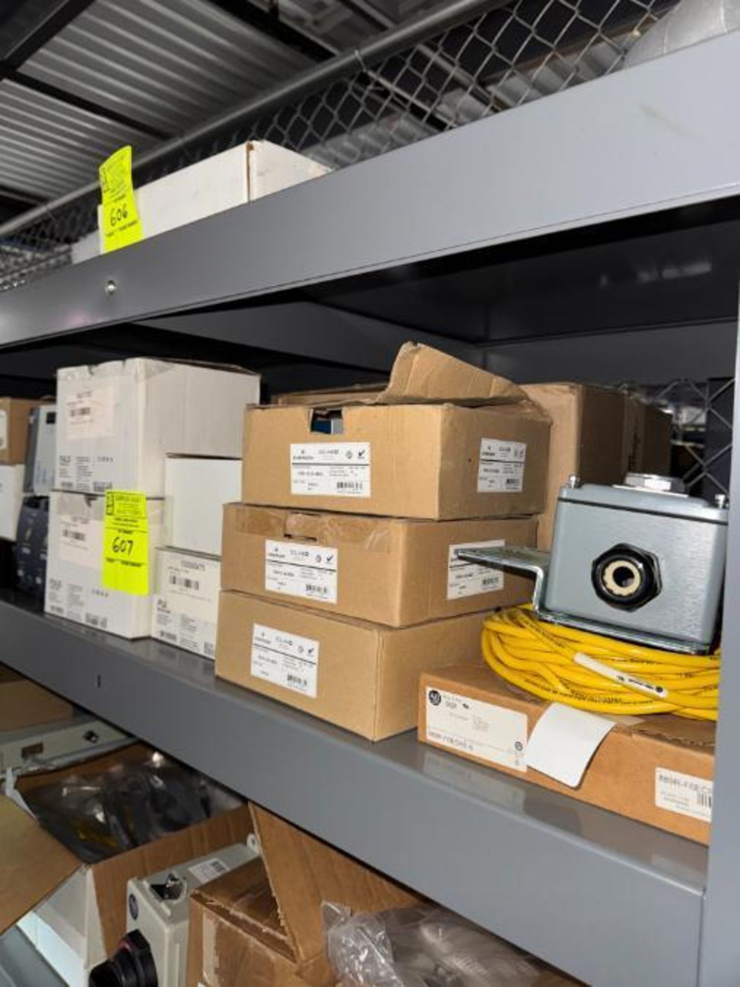 contents of shelf- power supplies, conveyor parts, etc