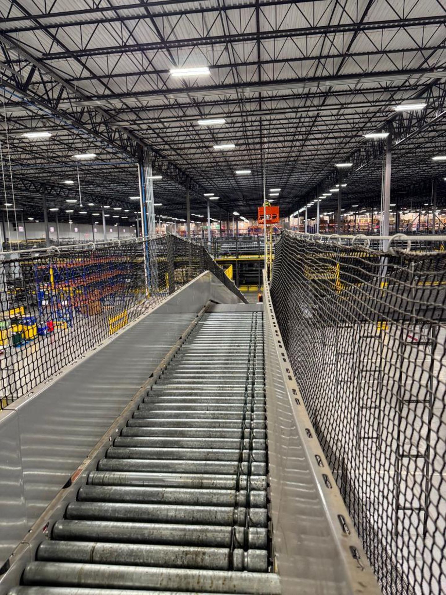Invata partially powered roller conveyor, on ~16' uprights - Image 3 of 3