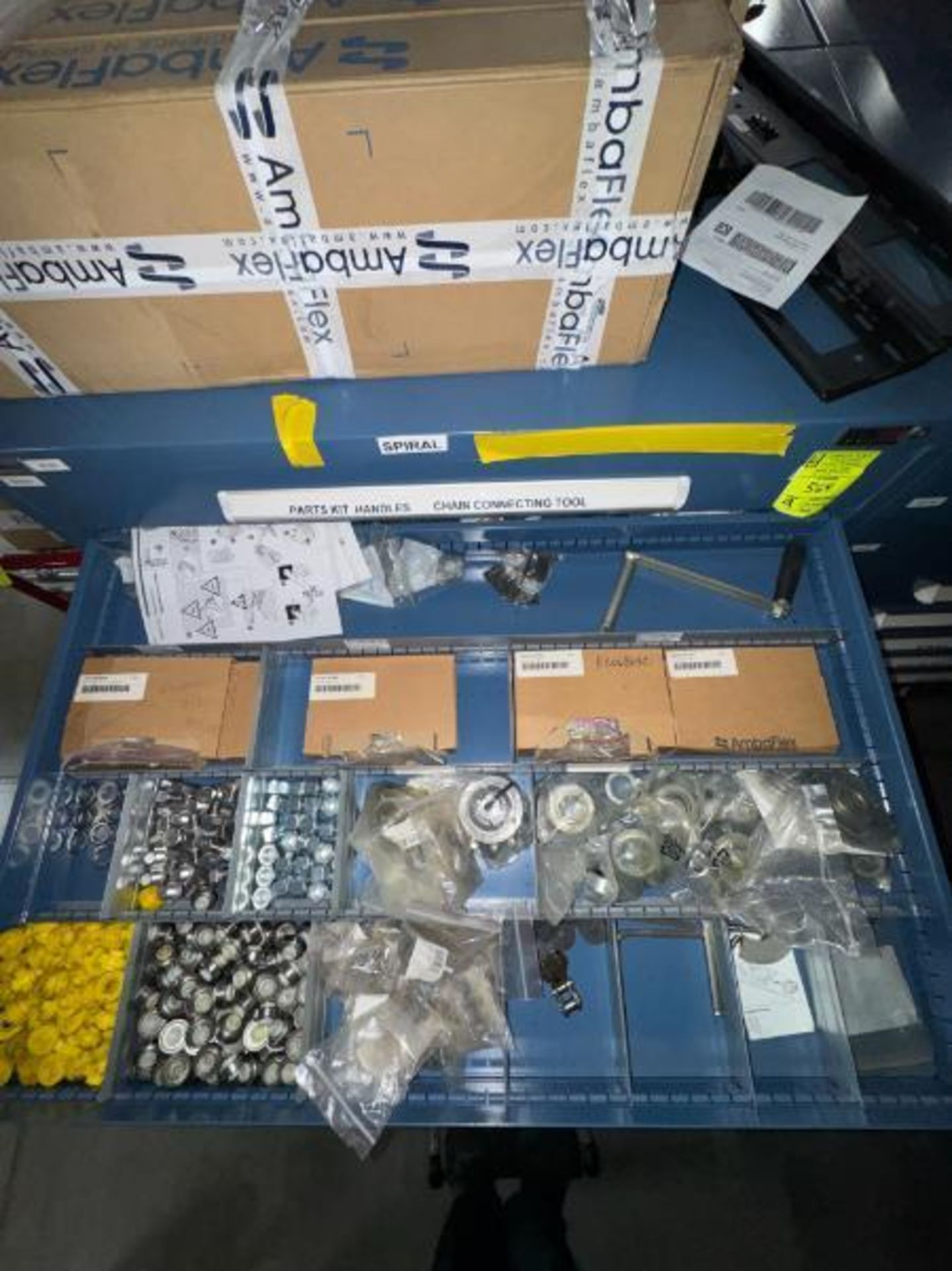 contents of 9) drawers- AmbaFlex spiralveyor parts- bearings, spacers,