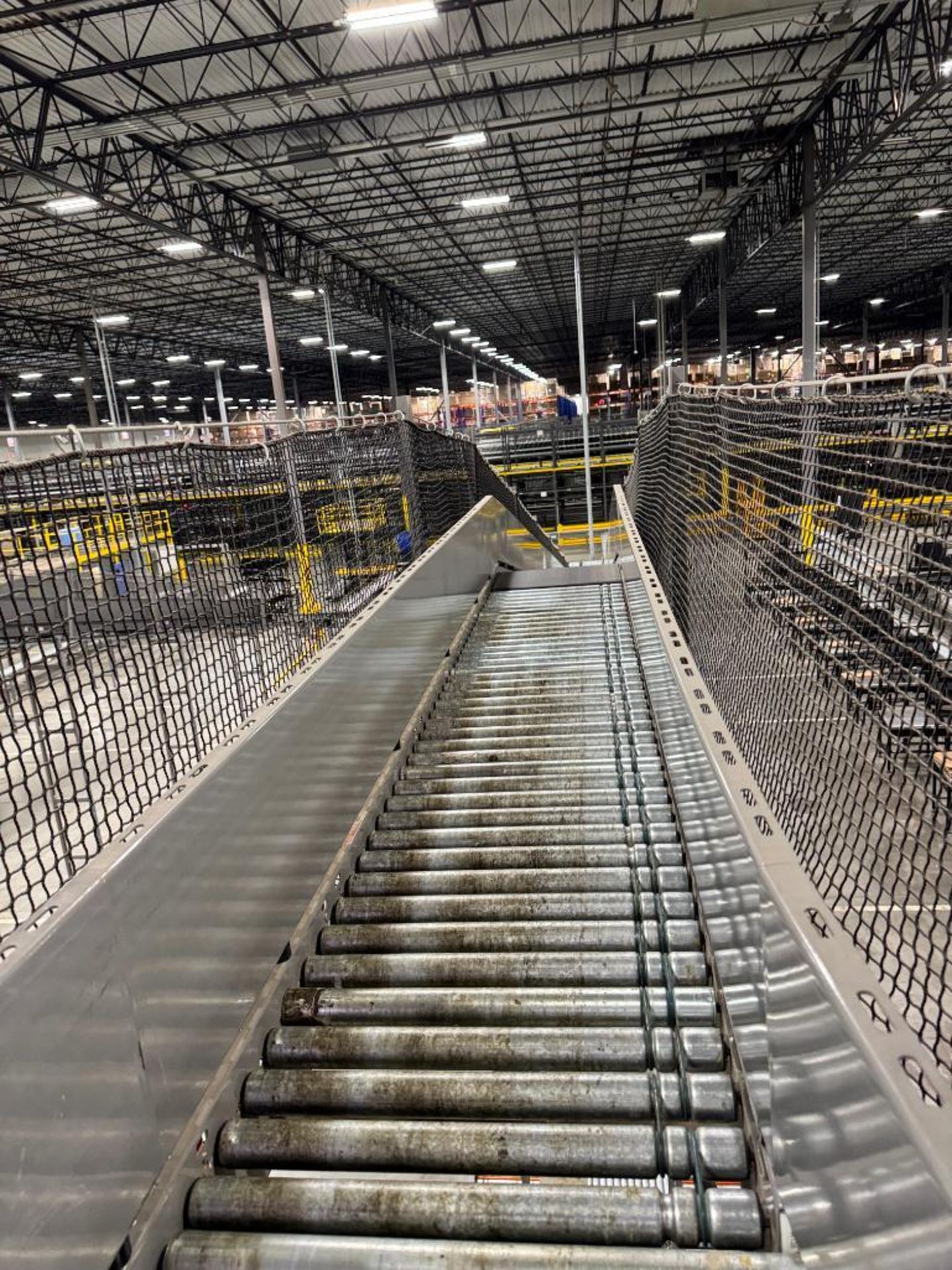 Invata partially powered roller conveyor, on ~16' uprights - Image 3 of 3