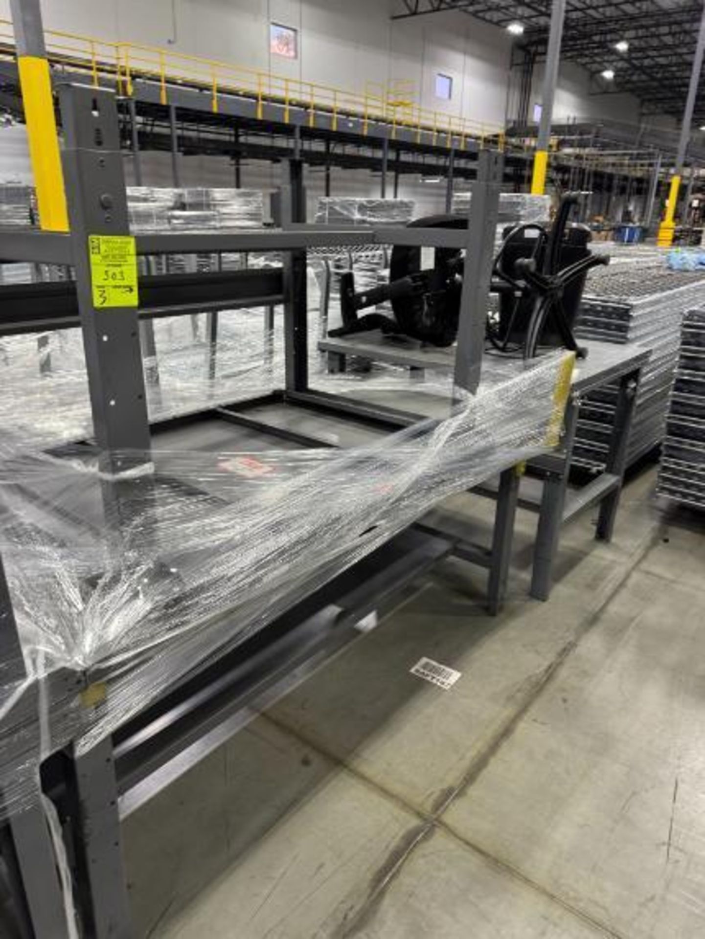 steel tables w/ high padded chair & paper shredder