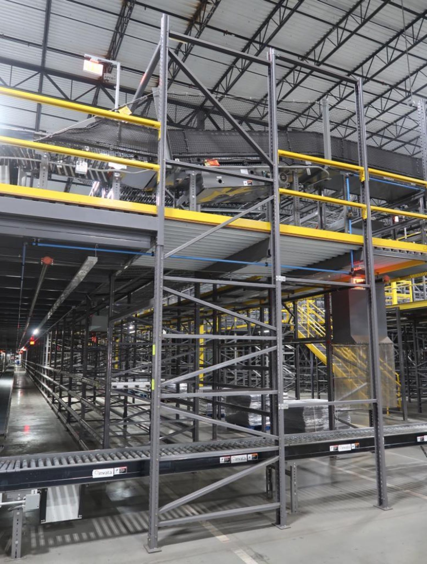 12) sections of pallet racking w/ gravity flow rollers