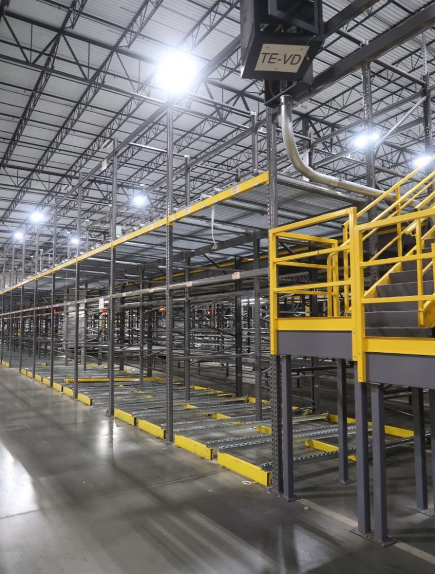 23) sections of pallet racking w/ gravity flow rollers