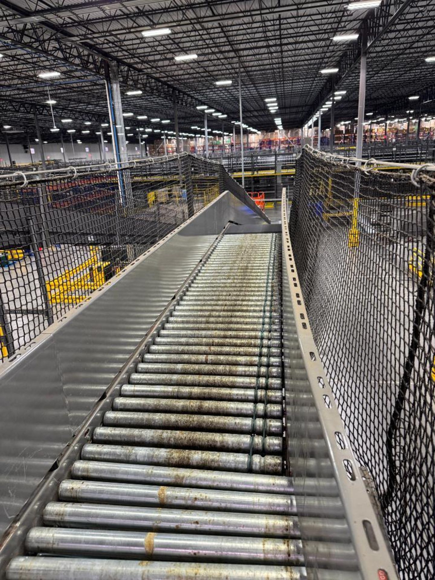Invata partially powered roller conveyor, on ~16' uprights - Image 3 of 3