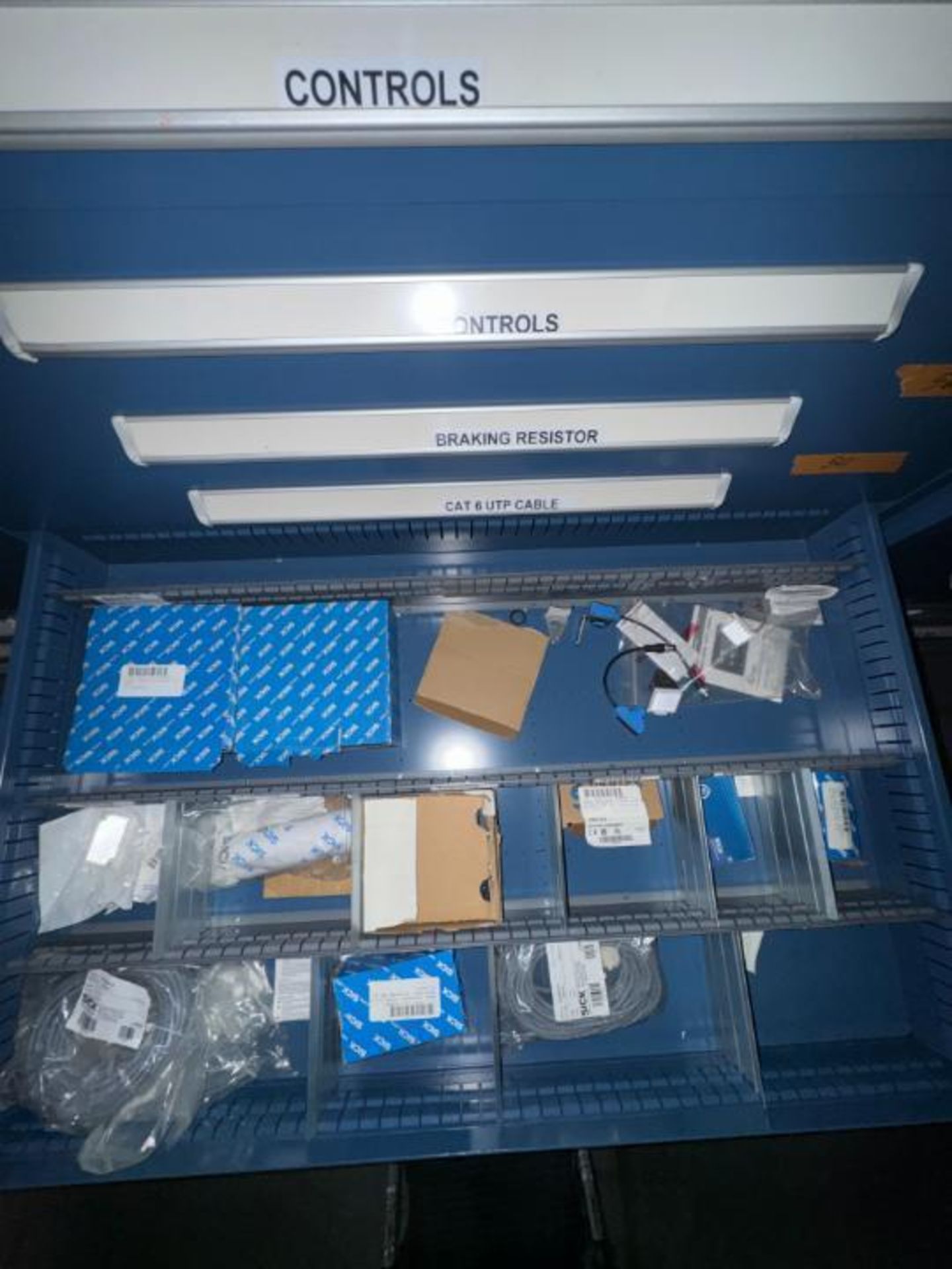 contents of 3) drawers- Sick bar code scanner parts, etc